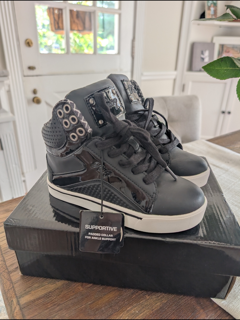Black High-Top Sneakers with White Sole